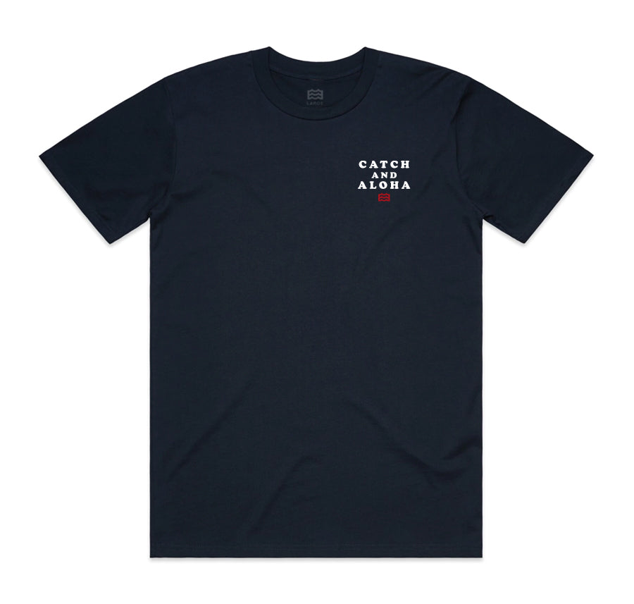 front of navy t-shirt with "catch and aloha" and wave logo on pocket 