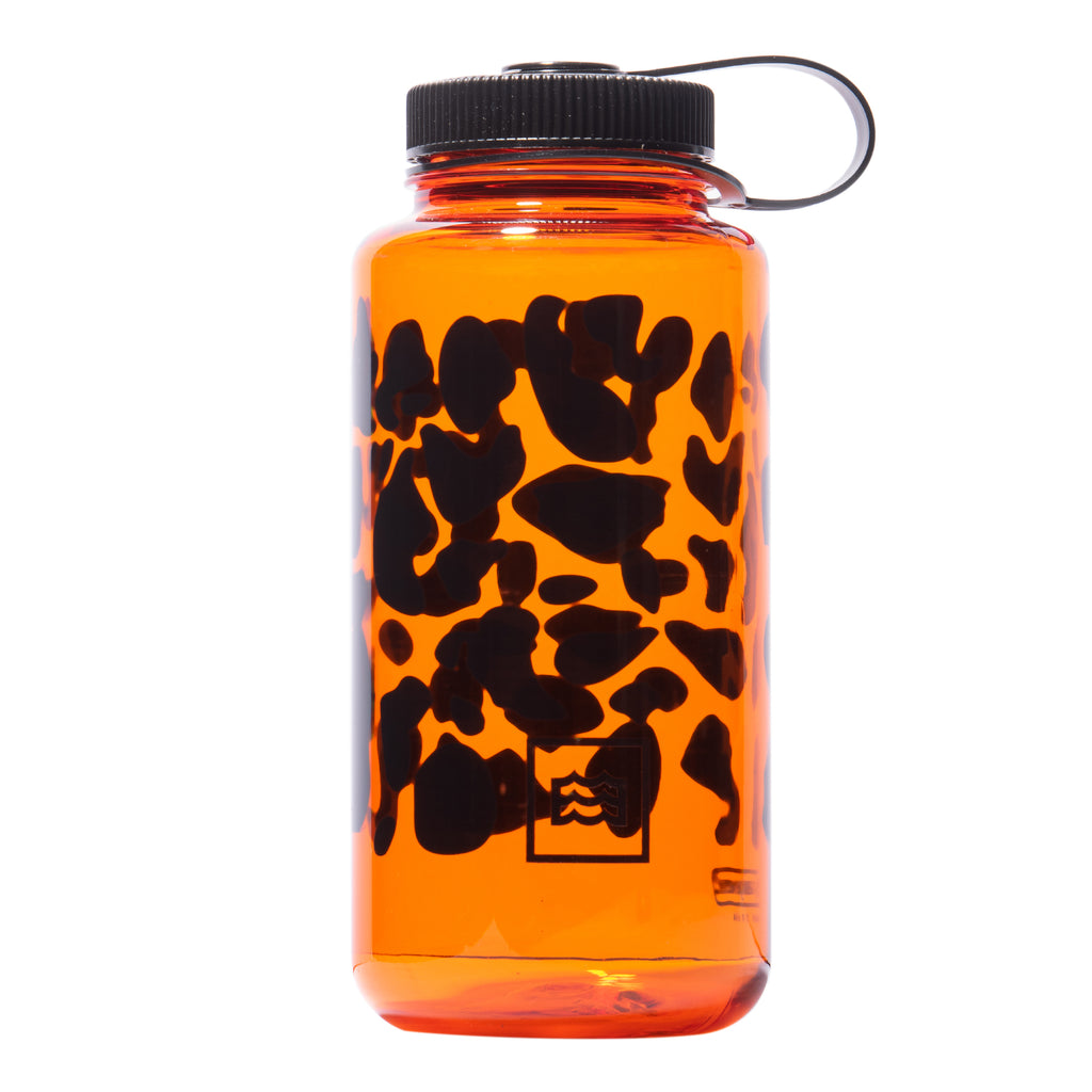 orange nalgene bottle with black camouflaged design 