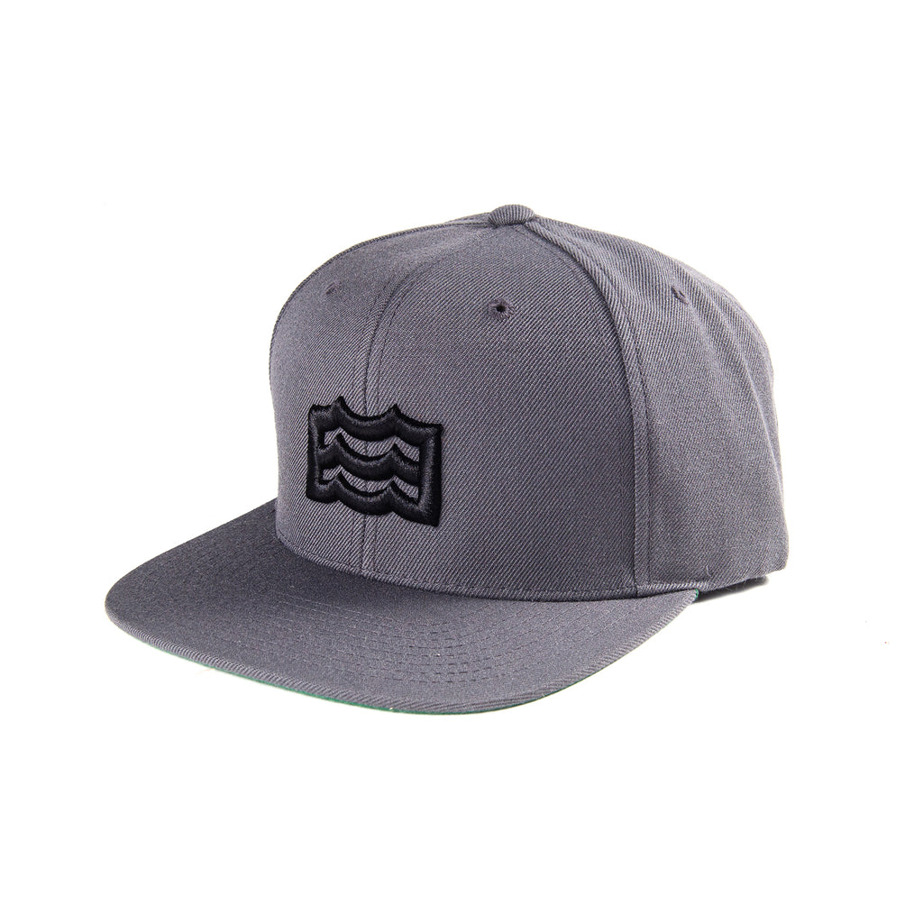 charcoal snapback with black woven wave logo