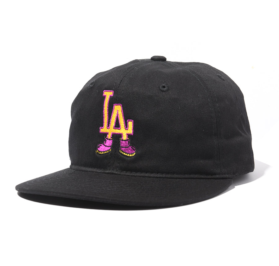 vintage black snapback hat with "LA" wearing shoes design 