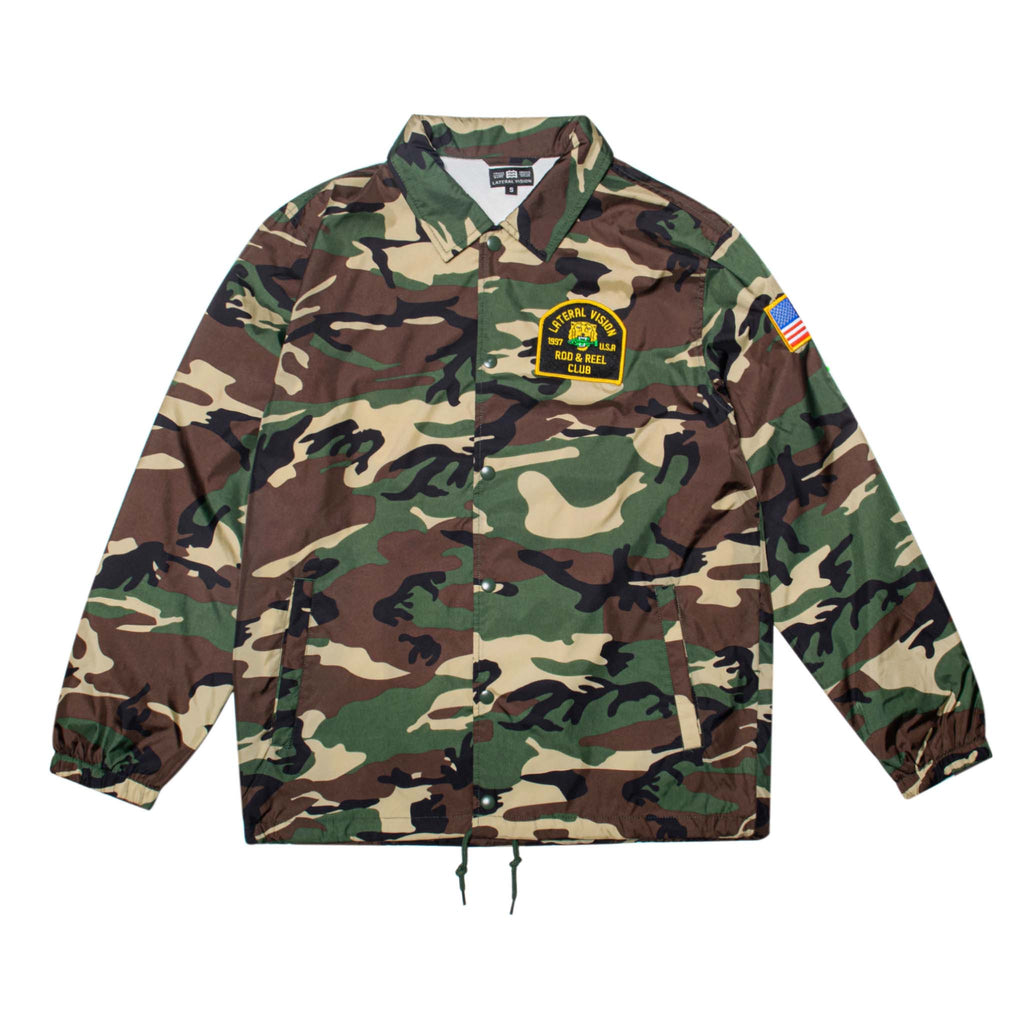 camouflaged jacket with lateral vision rod and reel club patch on pocket 