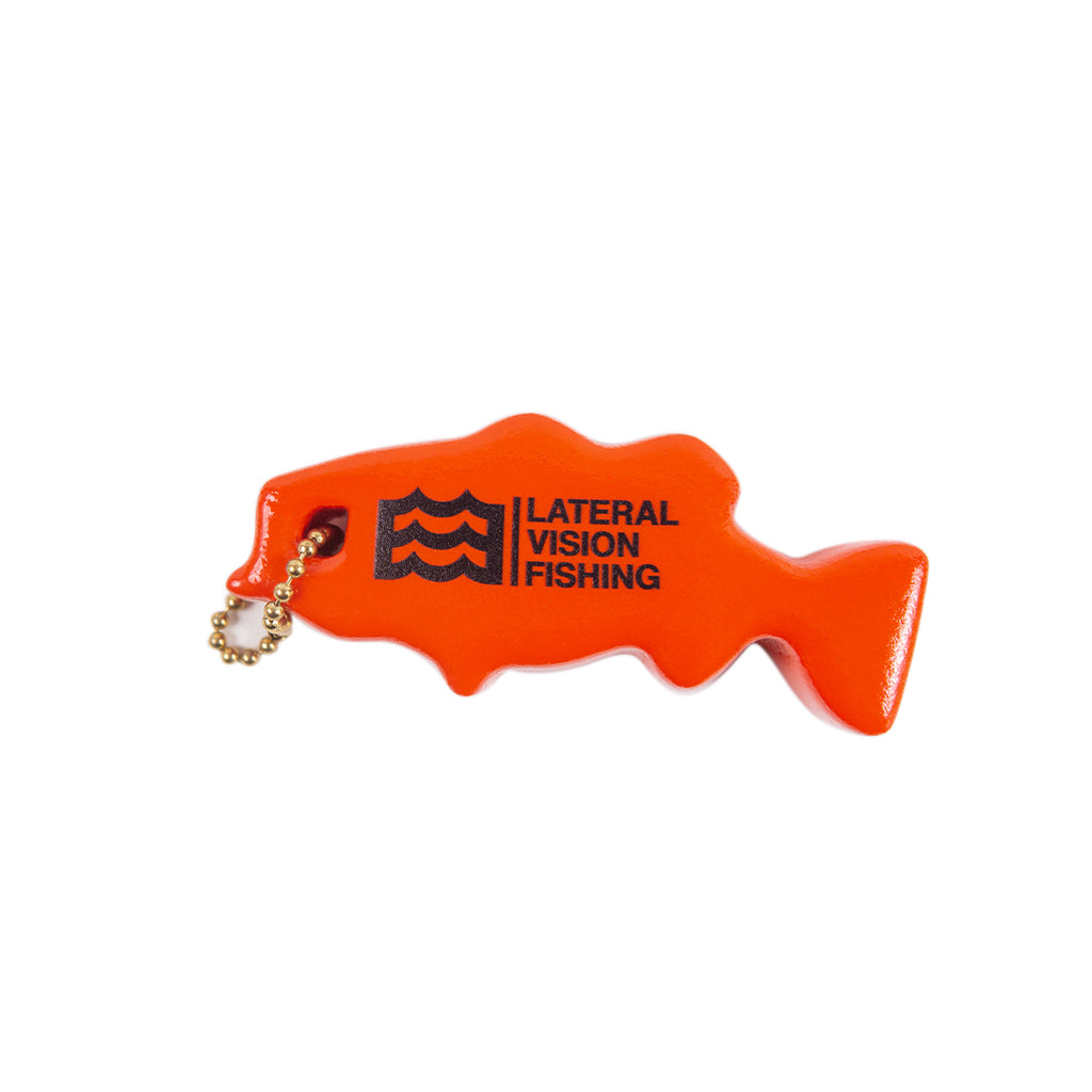 orange floating keychain in fish shape with lateral vision fishing logo 